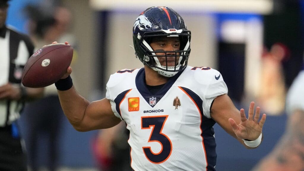 Dec 25, 2022; Inglewood, California, USA; Denver Broncos quarterback Russell Wilson (3) throws against the Los Angeles Rams during the first half at SoFi Stadium. 