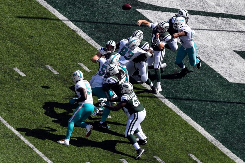 New York Jets quarterback Sam Darnold (14) throws against the Miami Dolphins in Week 2 at MetLife Stadium in East Rutherford, NJ on Sunday, September 16, 2018. Jets Vs Dolphins