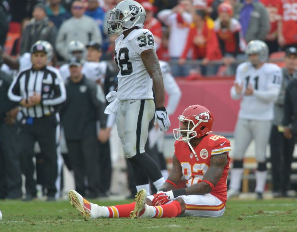 Dec 14, 2014; Kansas City, MO, USA; Kansas City Chiefs wide receiver Dwayne Bowe (82) reacts after dropping a pass during the first half against the Oakland Raiders at Arrowhead Stadium. The Chiefs won 31-13.