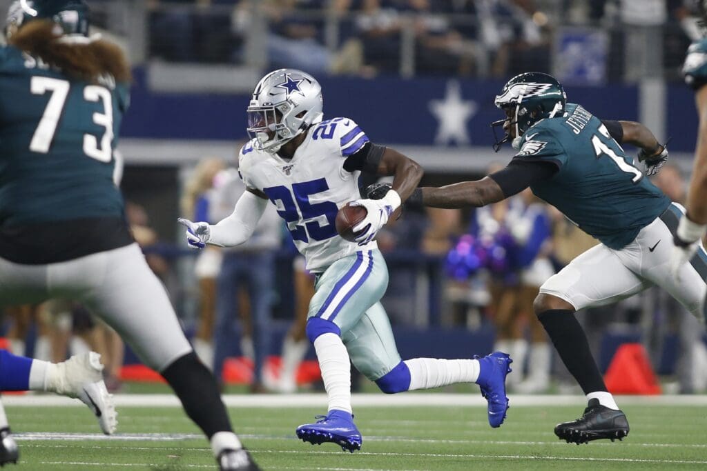 Oct 20, 2019; Arlington, TX, USA; Dallas Cowboys free safety Xavier Woods (25) returns an interception in the fourth quarter against the Philadelphia Eagles at AT&T Stadium. 