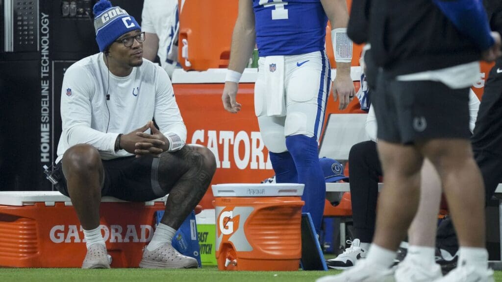Jan 5, 2025; Indianapolis, Indiana, USA; Indianapolis Colts quarterback Anthony Richardson (5) sits on the sideline during a game against the Jacksonville Jaguars at Lucas Oil Stadium.