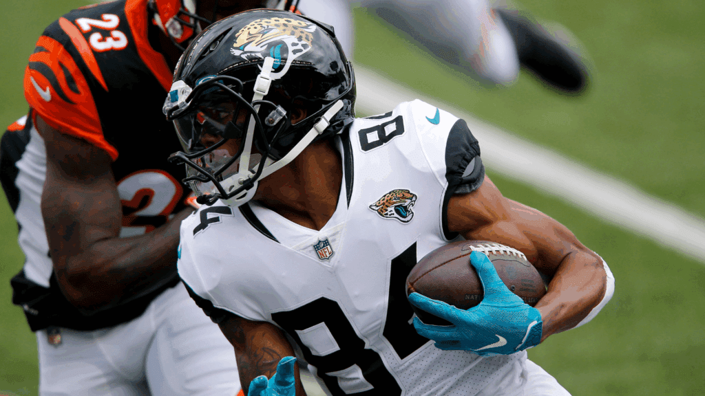 Oct 4, 2020; Cincinnati, Ohio, USA; Jacksonville Jaguars wide receiver Keelan Cole (84) runs the ball during the second quarter against the Cincinnati Bengals at Paul Brown Stadium.
