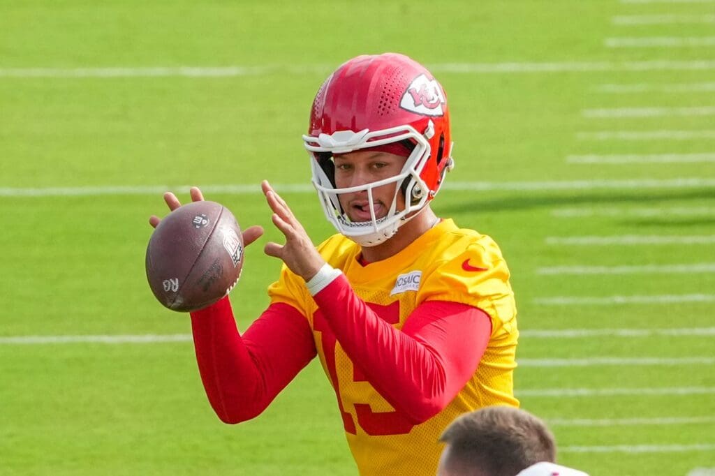 Jul 22, 2025; St. Joseph, MO, USA; Kansas City Chiefs quarterback Patrick Mahomes (15) receives a snap during training camp at Missouri Western State University. 