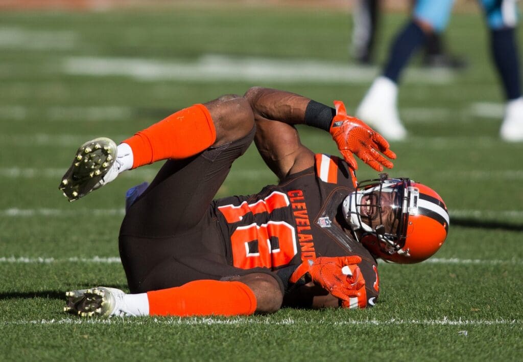 Oct 22, 2017; Cleveland, OH, USA; Cleveland Browns wide receiver Kenny Britt (18) rolls on the ground after suffering an apparent injury during overtime against the Tennessee Titans at FirstEnergy Stadium. 