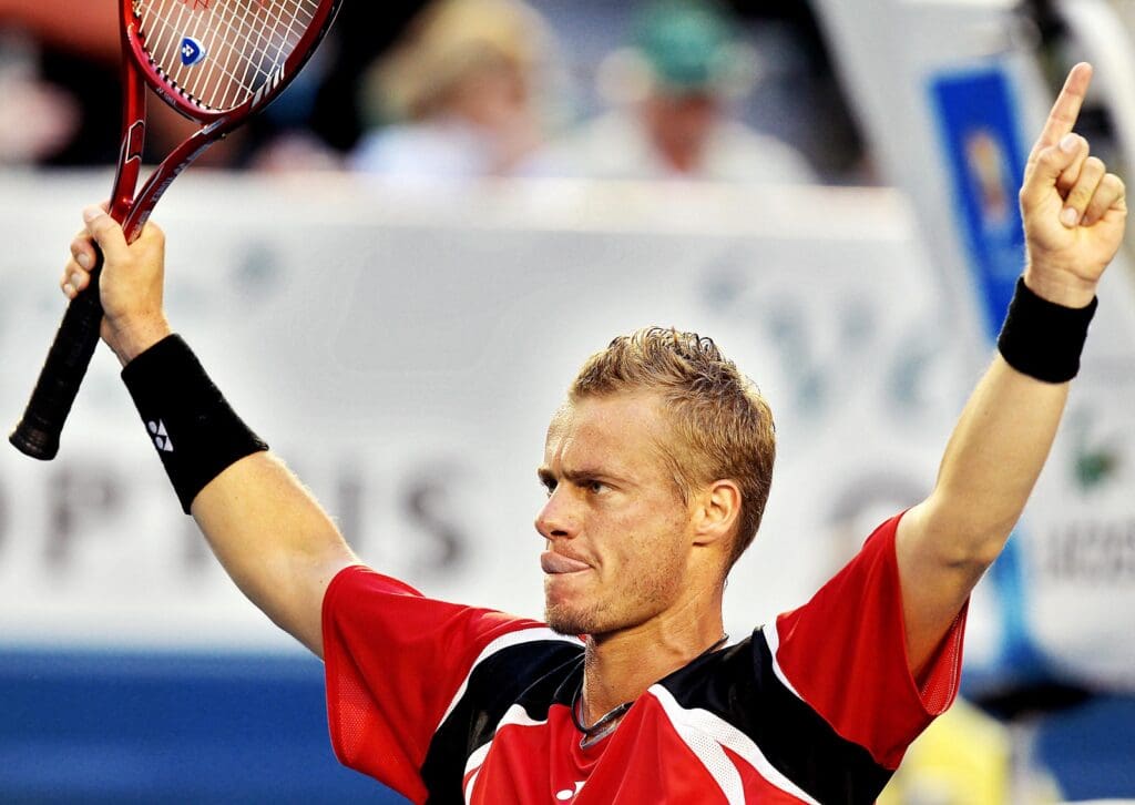 Jan 23, 2010; Melbourne, AUSTRALIA; Lleyton Hewitt (AUS) celebrates after his match against Marcos Baghdatis (CYP) on day six of the 2010 Australian Open in Melbourne Park. Hewitt won 6-0, 4-2 (retired).