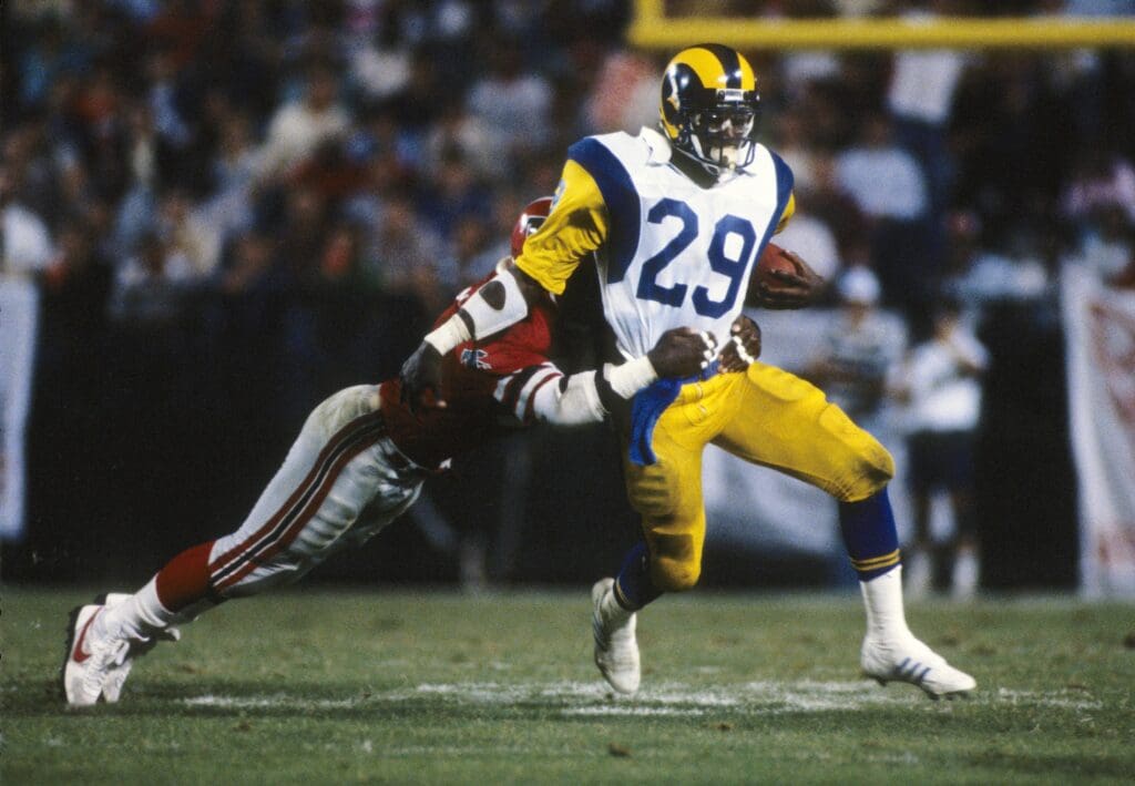 Unknown date; Atlanta, GA, USA; FILE PHOTO; Los Angeles Rams running back Eric Dickerson (29) carries the ball against the Atlanta Falcons at Fulton County Stadium. 