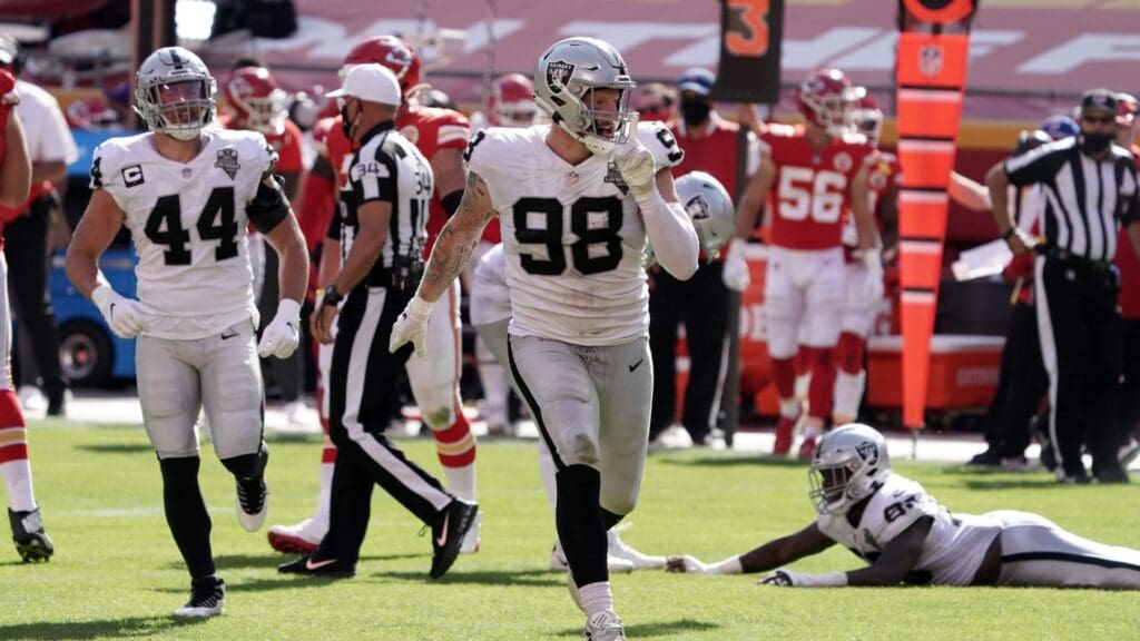 Oct 11, 2020; Kansas City, Missouri, USA;Las Vegas Raiders defensive end Maxx Crosby (98) celebrates after a sack in the third quarter against the Kansas City Chiefs at Arrowhead Stadium. The Raiders defeated the Chiefs 40-32.