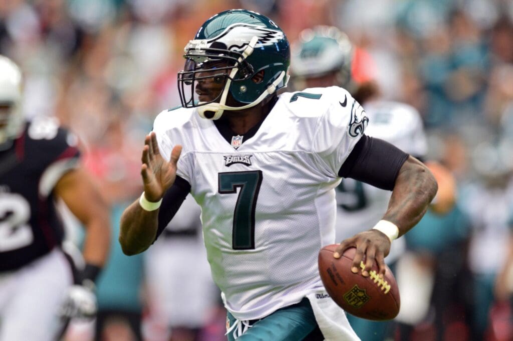 Sept. 23, 2012; Glendale, AZ, USA; Philadelphia Eagles quarterback Michael Vick (7) runs up field with the ball during the first half against the Arizona Cardinals at University of Phoenix Stadium.