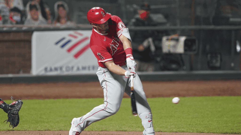 August 20, 2020; San Francisco, California, USA; Los Angeles Angels center fielder Mike Trout (27) hits a triple during the seventh inning against the San Francisco Giants at Oracle Park.