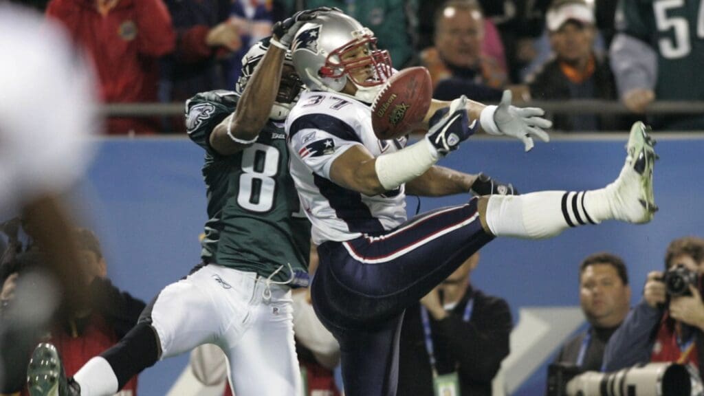 Feb 06, 2005; Jacksonville, FL, USA; New England Patriots safety Rodney Harrison (37) breaks up a pass intended for Philadelphia Eagles receiver Terrell Owens (81) during the Patriots 24-21 win in Super Bowl XXXIX at Alltel Stadium.