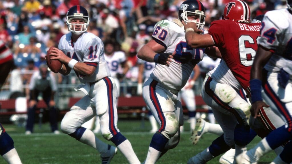 Oct 14, 1984; Atlanta, GA,USA; FILE PHOTO; New York Giants quarterback Phil Simms (11) in action against the Atlanta Falcons. The Giants beat the Falcons 19-7. 