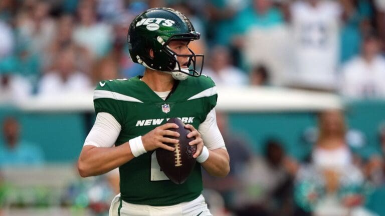 Dec 17, 2023; Miami Gardens, Florida, USA; New York Jets quarterback Zach Wilson (2) drops back to attempt a pass against the Miami Dolphins during the first half at Hard Rock Stadium.
