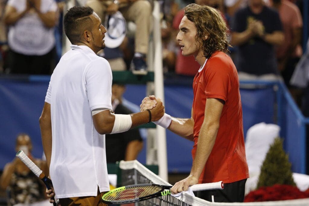 Aug 3, 2019; Washington, D.C., USA; Nick Kyrgios of Australia (L) shakes hands with Stefanos Tsitsipas of Greece (R) in a men s singles semifinal of the 2019 Citi Open at William H.G. FitzGerald Tennis Center.