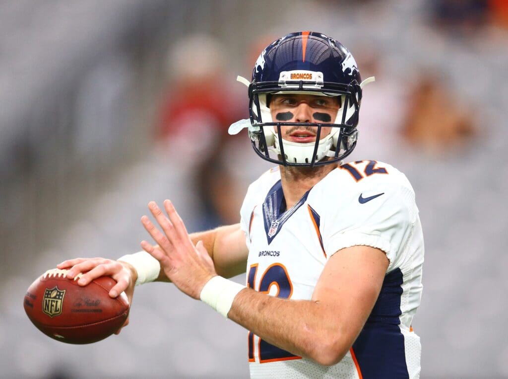 Sep 1, 2016; Glendale, AZ, USA; Denver Broncos quarterback Paxton Lynch (12) against the Arizona Cardinals during a preseason game at University of Phoenix Stadium.