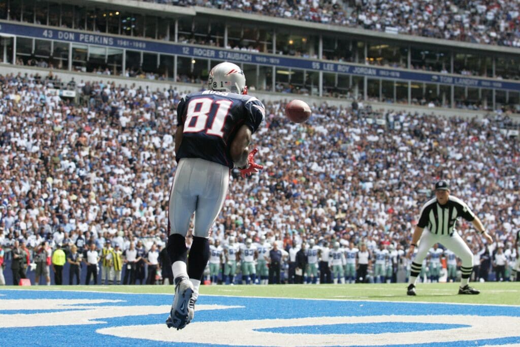 Oct 14, 2007; Irving, TX, USA; New England Patriots wide receiver Randy Moss (81) catches a touchdown against the Dallas Cowboys at Texas Stadium.