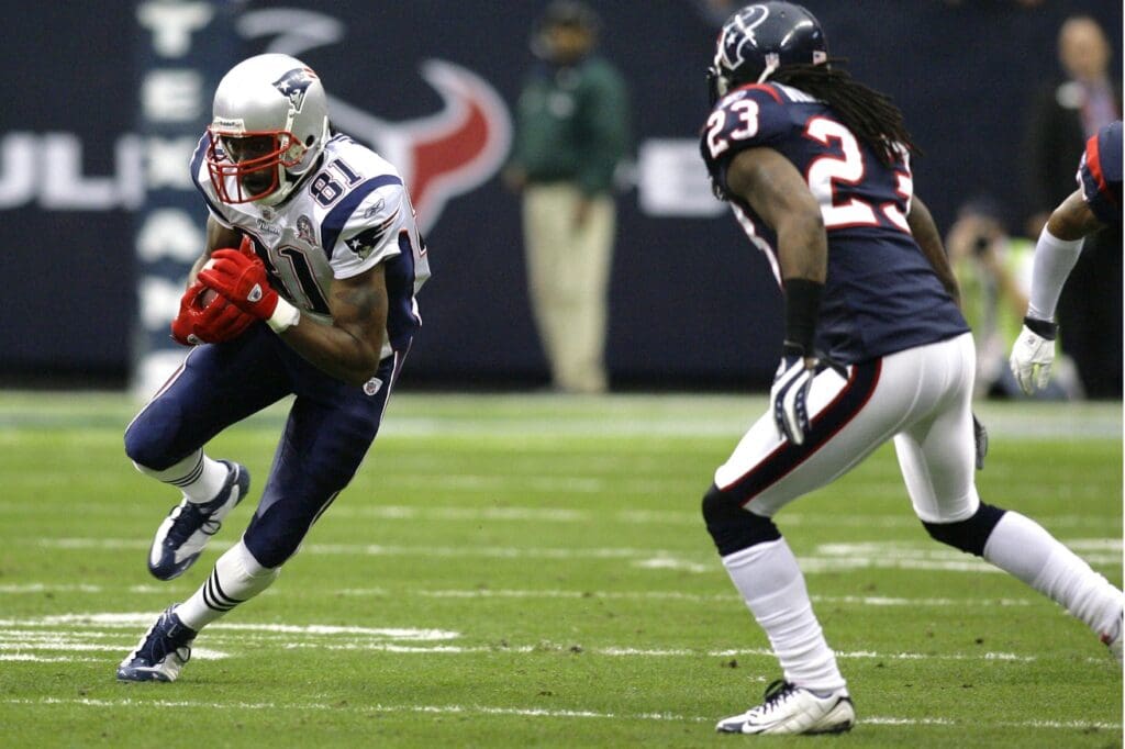 Jan 3, 2010; Houston, TX, USA; New England Patriots wide receiver Randy Moss (81) runs after a catch against the Houston Texans in the first quarter at Reliant Stadium.