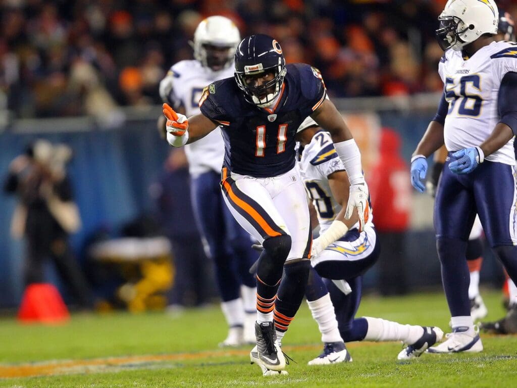Nov 20, 2011; Chicago, IL, USA; Chicago Bears wide receiver Roy Williams (11) celebrates making a reception during the second half against the San Diego Chargers at Soldier Field. The Bears defeated the Chargers 31-20