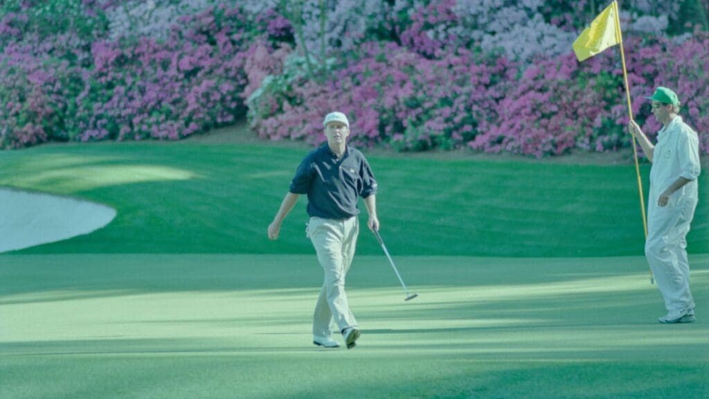 04/14/1995; Augusta, Georgia, USA; Scott Hoch walks on the green while caddie hold the flag at the Augusta National Golf Course during the 1995 Masters.