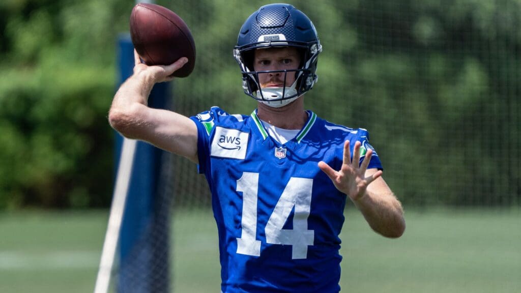 Jun 11, 2025; Renton, WA, USA; Seattle Seahawks quarterback Sam Darnold (14) passes the ball during mini-camp at Virginia Mason Athletic Center.