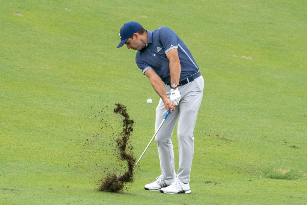 January 8, 2021; Maui, Hawaii, USA; Sergio Garcia hits his second shot on the 13th hole during the second round of the Sentry Tournament of Champions golf tournament at Kapalua Resort - The Plantation Course.
