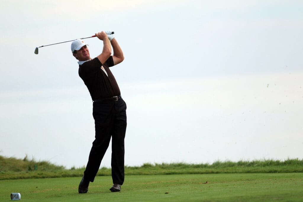 Aug 14, 2010; Haven, WI, USA; Steve Elkington hits his tee shot on the fourth hole during the continuation of the second round of the 2010 PGA Championship at Whistling Straits.