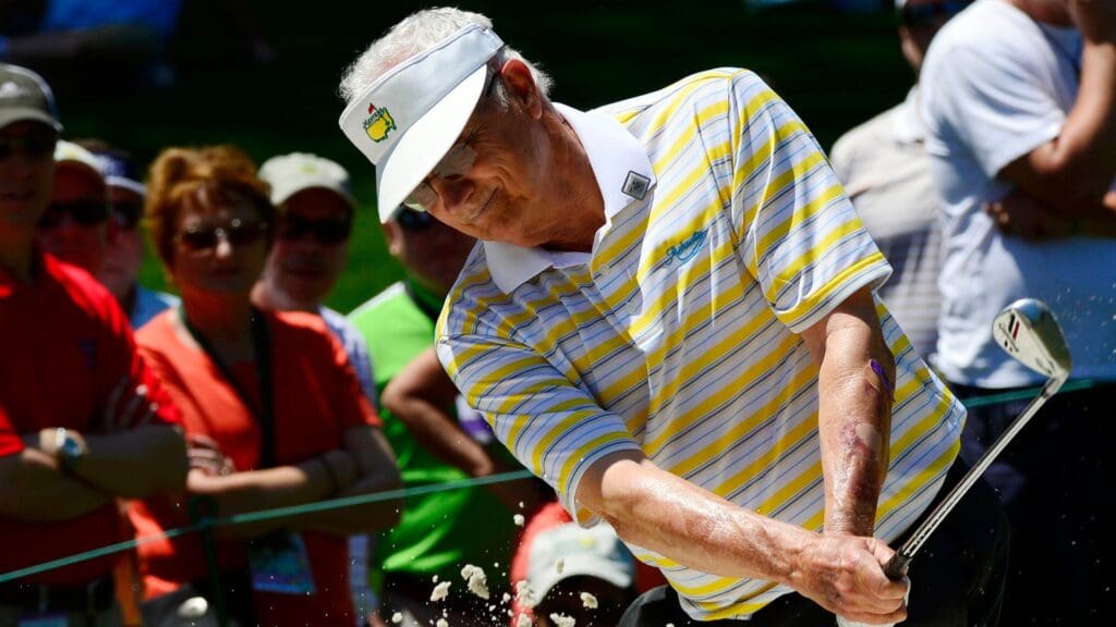 Apr 10, 2013; Augusta, GA, USA; Tommy Aaron hits out of a bunker on the second hole during the Par 3 Contest before the 2013 The Masters golf tournament at Augusta National Golf Club.