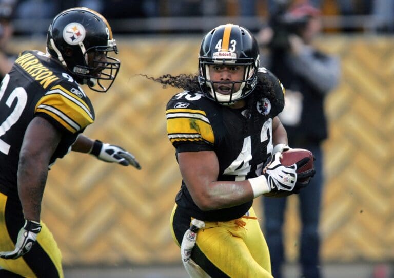 November 21, 2010; Pittsburgh,PA, USA: Pittsburgh Steelers safety Troy Polamalu (43) runs with the ball after an interception against the Oakland Raiders during the third quarter at Heinz Field. The Steelers won 35-3.