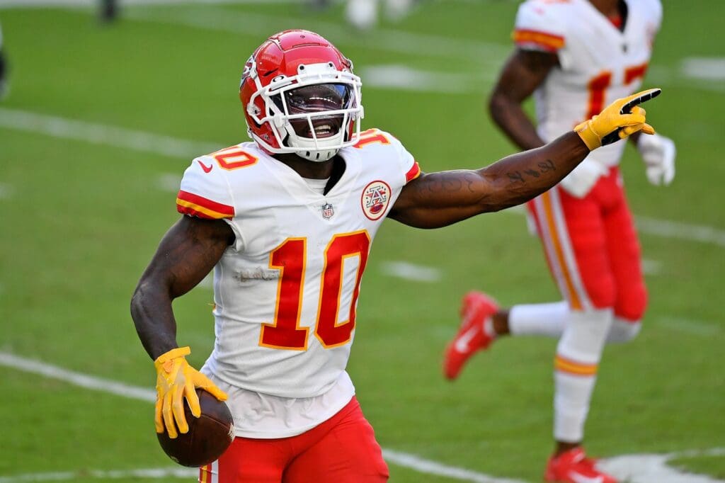 Dec 13, 2020; Miami Gardens, Florida, USA; Kansas City Chiefs wide receiver Tyreek Hill (10) celebrates his touchdown against the Miami Dolphins during the second half at Hard Rock Stadium.