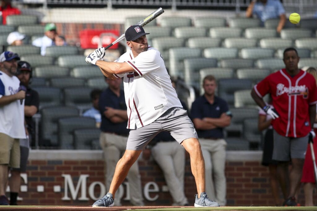 Aug 11, 2018; Atlanta, GA, USA; Former Atlanta Braves outfielder Jeff Francoeur (7) hits at the Alumni Softball Home Run Derby before a game against the Milwaukee Brewers at SunTrust Park. Mandatory Credit: Brett Davis-USA TODAY Sports