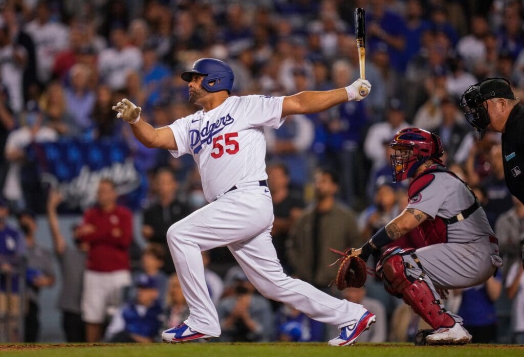 Los Angeles Dodgers pinch hitter Albert Pujols hits against the St. Louis Cardinals during the ninth inning of the National League Wild Card Game at Dodger Stadium on Oct 6, 2021.
