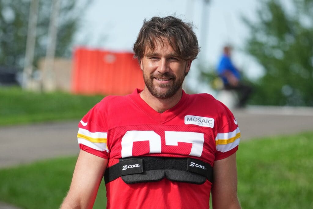 Jul 22, 2025; St. Joseph, MO, USA; Kansas City Chiefs tight end Travis Kelce (87) walks down the hill to the practice fields during training camp at Missouri Western State University. Mandatory Credit: Denny Medley-Imagn Images