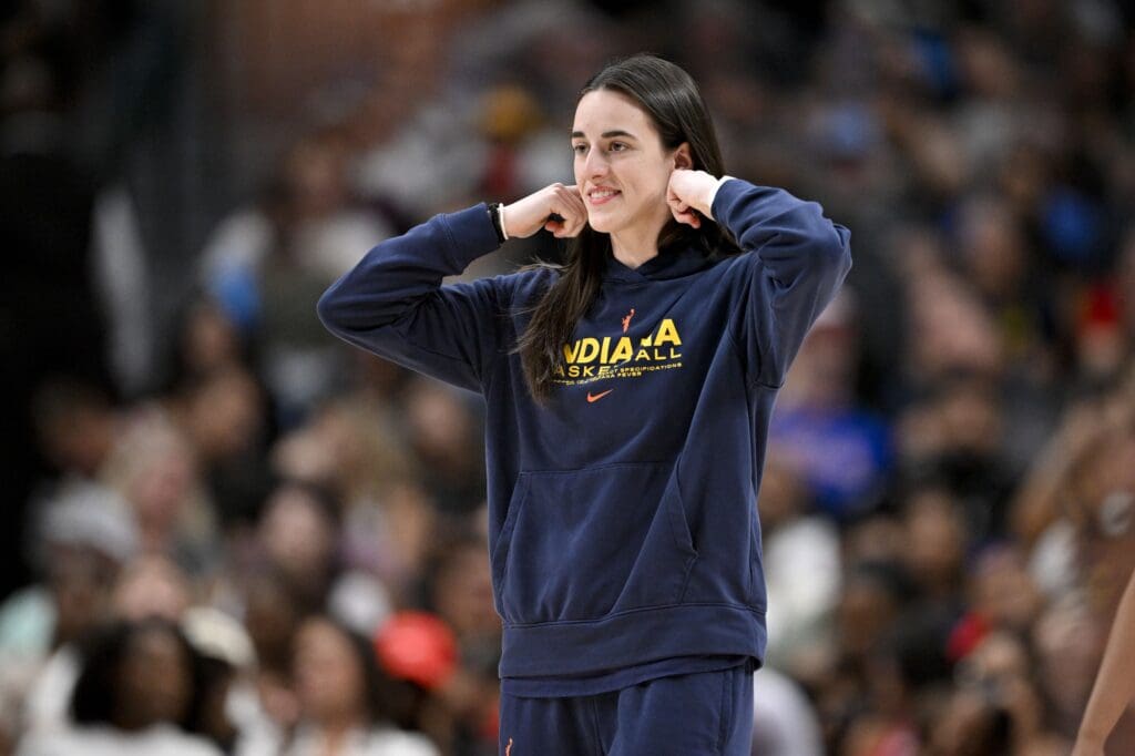 Aug 1, 2025; Dallas, Texas, USA; Indiana Fever guard Caitlin Clark (22) walks on to the court during the second half against the Dallas Wings at the American Airlines Center. Mandatory Credit: Jerome Miron-Imagn Images