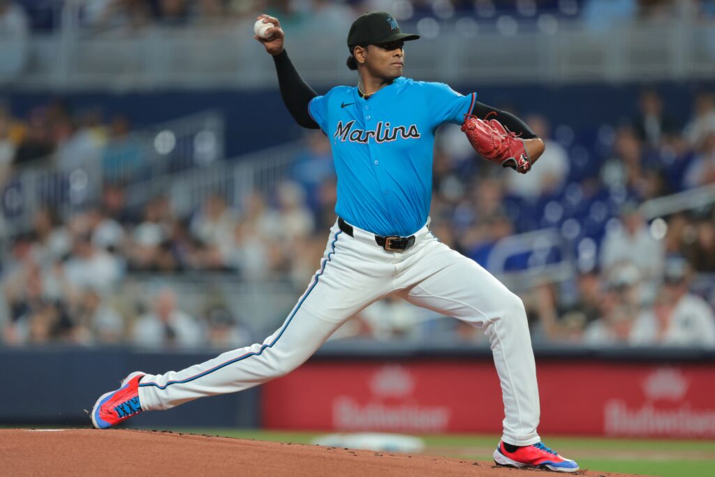 Aug 3, 2025; Miami, Florida, USA; Miami Marlins starting pitcher Edward Cabrera (27) delivers a pitch against the New York Yankees during the first inning at loanDepot Park. Mandatory Credit: Sam Navarro-Imagn Images