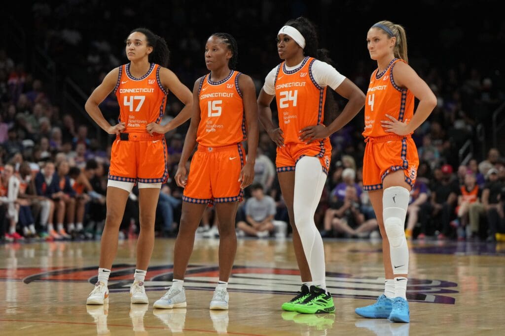 Aug 5, 2025; Phoenix, Arizona, USA; Connecticut Sun guard Leila Lacan (47), guard Lindsay Allen (15), forward Aneesah Morrow (24), and guard Jacy Sheldon (4) line up against the Phoenix Mercury in the second half at Footprint Center. Mandatory Credit: Rick Scuteri-Imagn Images