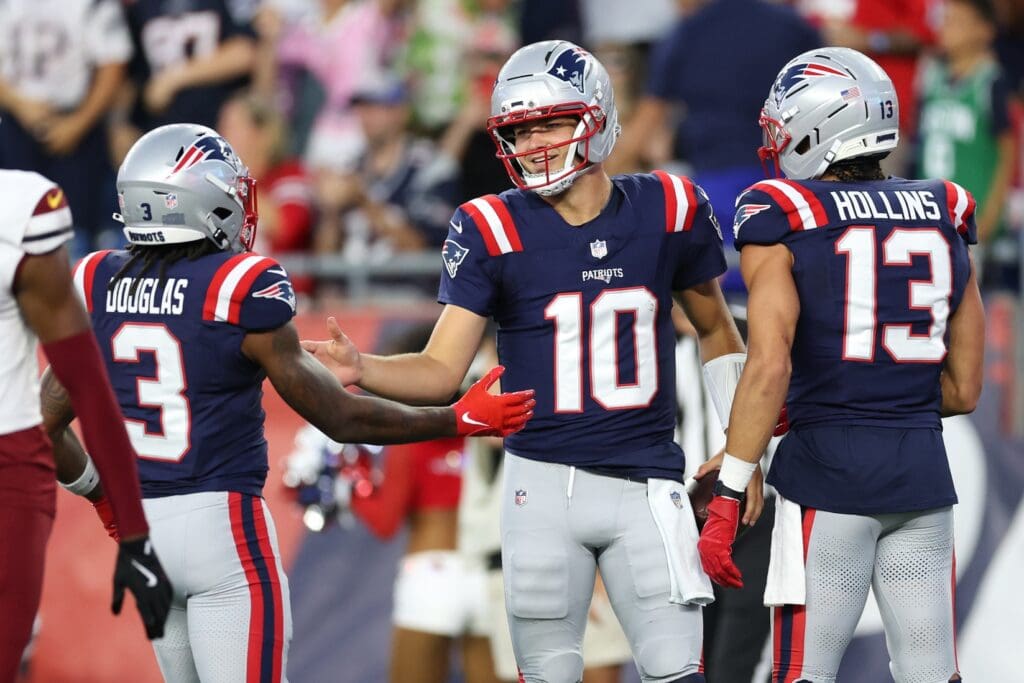Aug 8, 2025; Foxborough, Massachusetts, USA; New England Patriots quarterback Drake Maye (10) celebrates after scoring a touchdown during the first half against the Washington Commanders at Gillette Stadium. Mandatory Credit: Paul Rutherford-Imagn Images