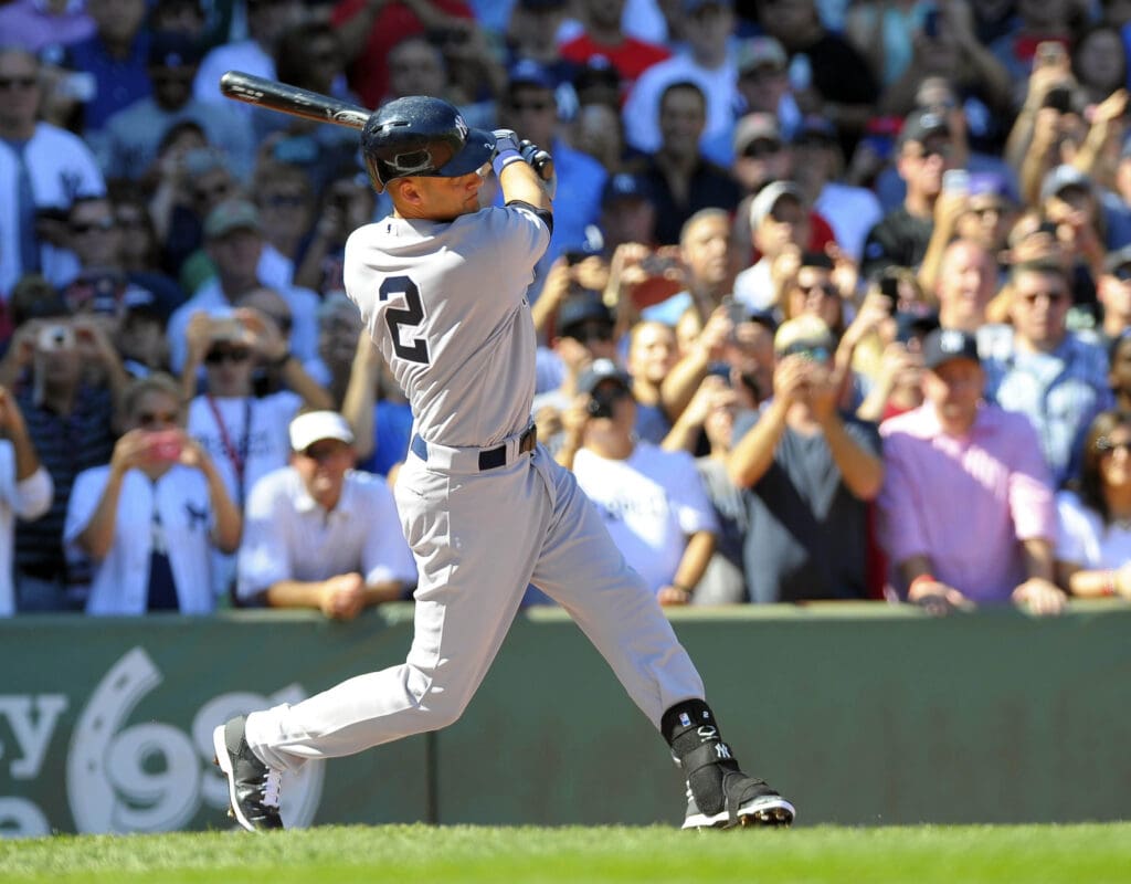Sep 27, 2014; Boston, MA, USA; New York Yankees shortstop Derek Jeter (2) at bat during the first inning against the Boston Red Sox at Fenway Park. Mandatory Credit: Bob DeChiara-USA TODAY Sports