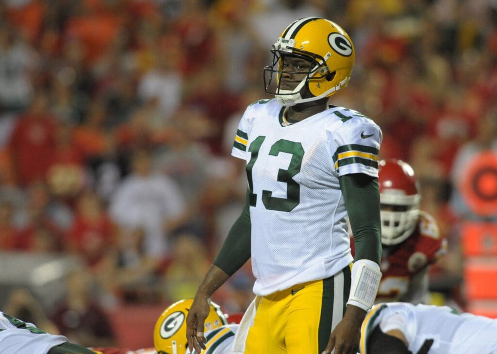 Aug 29, 2013; Kansas City, MO, USA; Green Bay Packers quarterback Vince Young (13) looks to the sidelines during the second half of the game against the Kansas City Chiefs at Arrowhead Stadium. The Chiefs won 30-8